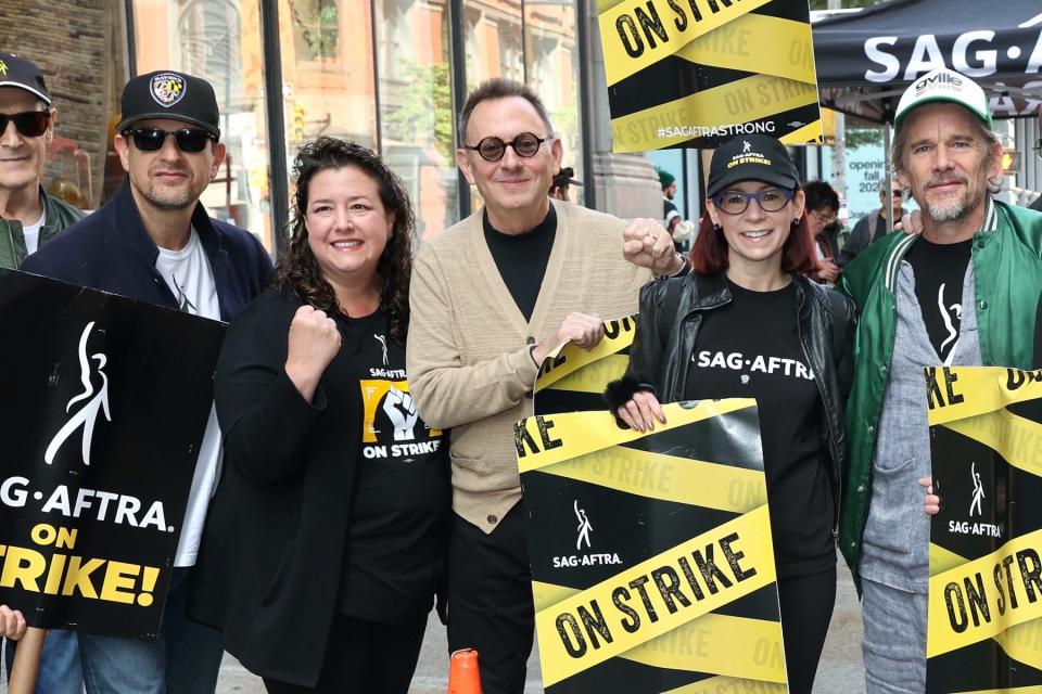 Josh Charles, Rebecca Damon, Michael Emerson, Carrie Preston, and Ethan Hawke at the SAG-AFTRA picket line outside the HBO building on October 17, 2023, in New York City.