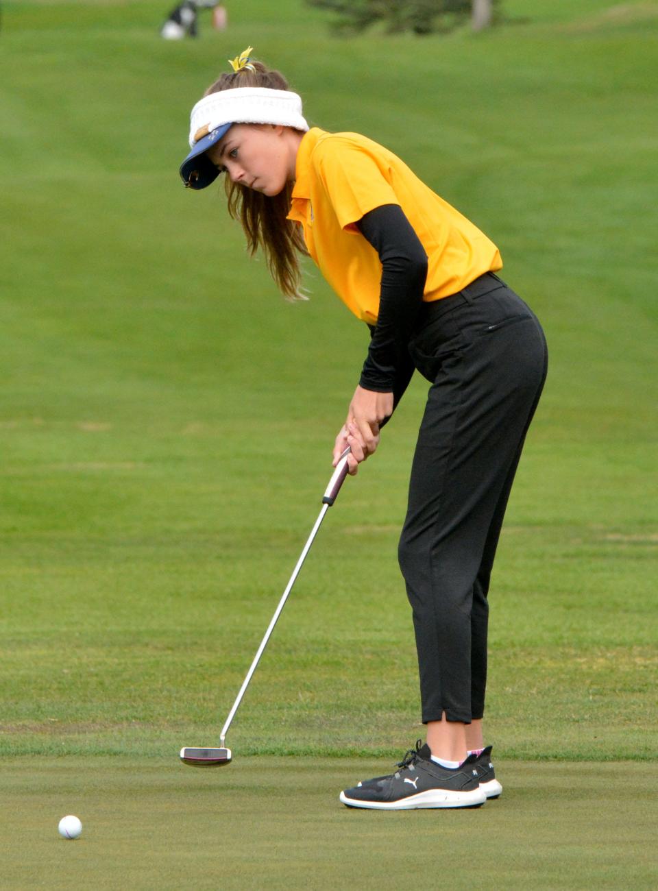 Aberdeen Central's Olivia Braun putts on No. 1 Yellow earlier this season during the Watertown Girls Golf Invitational at Cattail Crossing Golf Course.