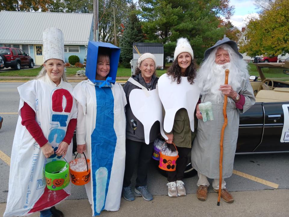 Tooth Wizard, Dr. Ray Colavincenzo, retired dentist, was Grand Marshal of Clyde's Halloween Parade. His four daughters dressed as a tube of toothpaste, tooth brush and teeth.