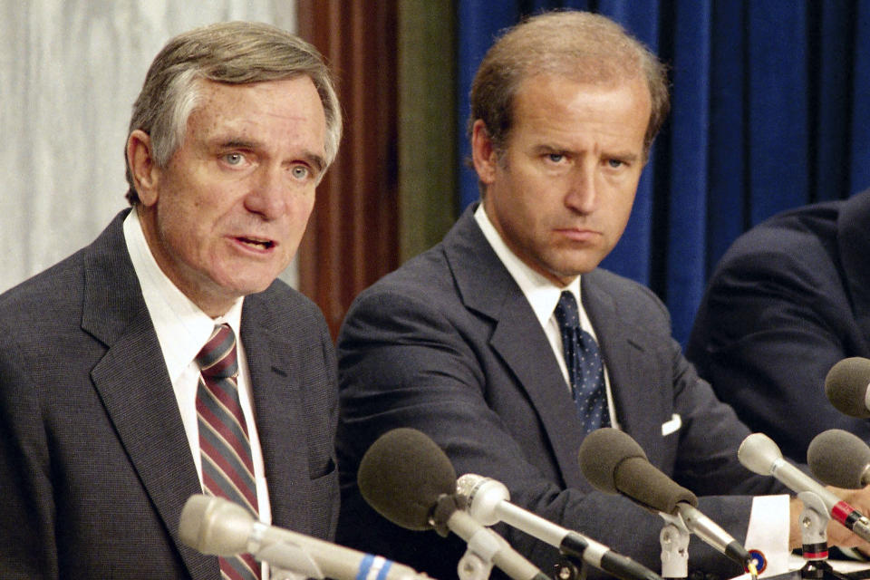 FILE - Sen. Lawton Chiles, D-Fla., left, and Sen. Joseph Biden, D-Del., talk to reporters about a legislative package to address the problem of crack cocaine on Aug. 5, 1986, on Capitol Hill in Washington. Some borrowers of color stand to benefit less from President Bides’s proposal to provide student loan forgiveness as at least a generation of Black and Hispanic Americans were disproportionately shut out of the Pell Grant program, due to a “war on drugs” era policy that he supported as a U.S. senator. (AP Photo/Scott Stewart, File)