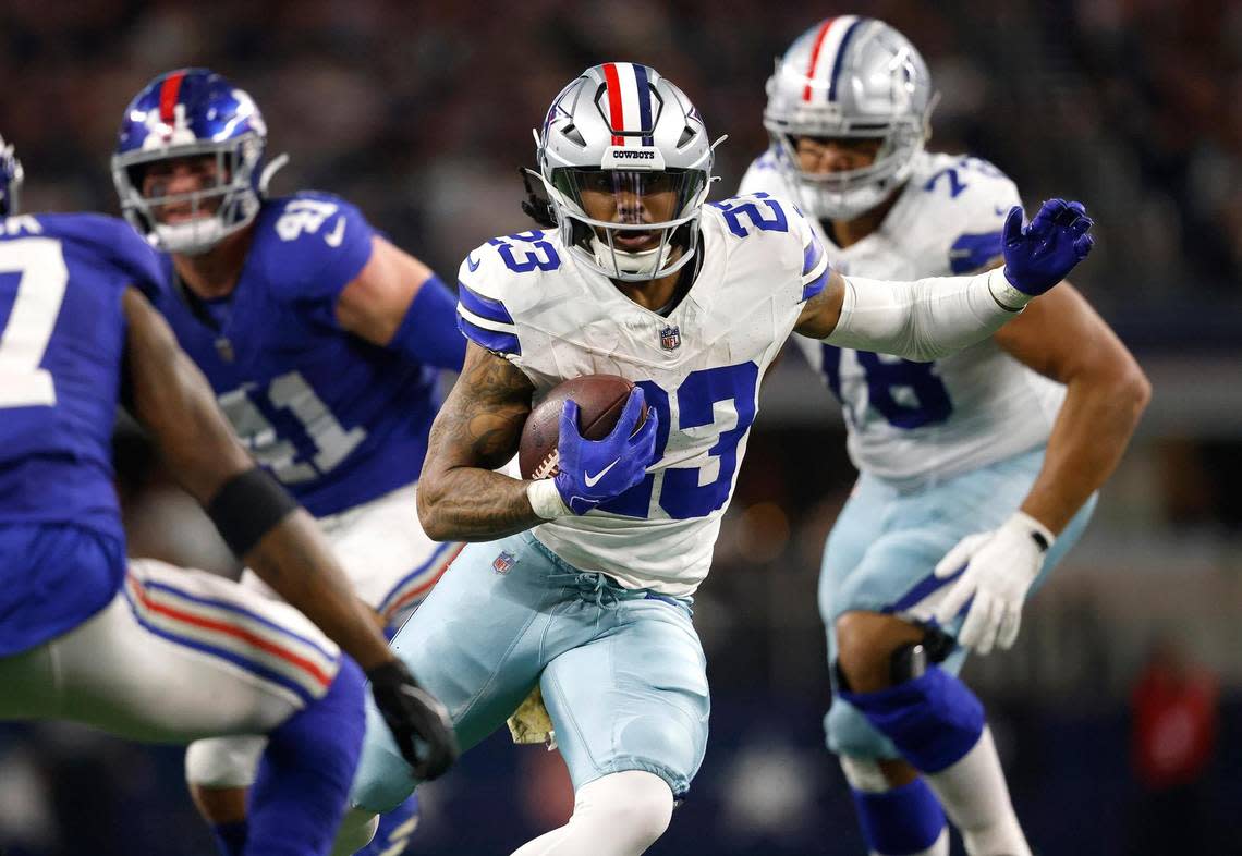 Dallas Cowboys running back Rico Dowdle runs the ball during the second quarter against the New York Giants on Sunday, November 12, 2023, at AT&T Stadium in Arlington. Amanda McCoy/amccoy@star-telegram.com