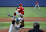 Cincinnati Reds starting pitcher Graham Ashcraft winds up during the second inning of the team's baseball game against the Miami Marlins, Friday, May 12, 2023, in Miami. (AP Photo/Michael Laughlin)