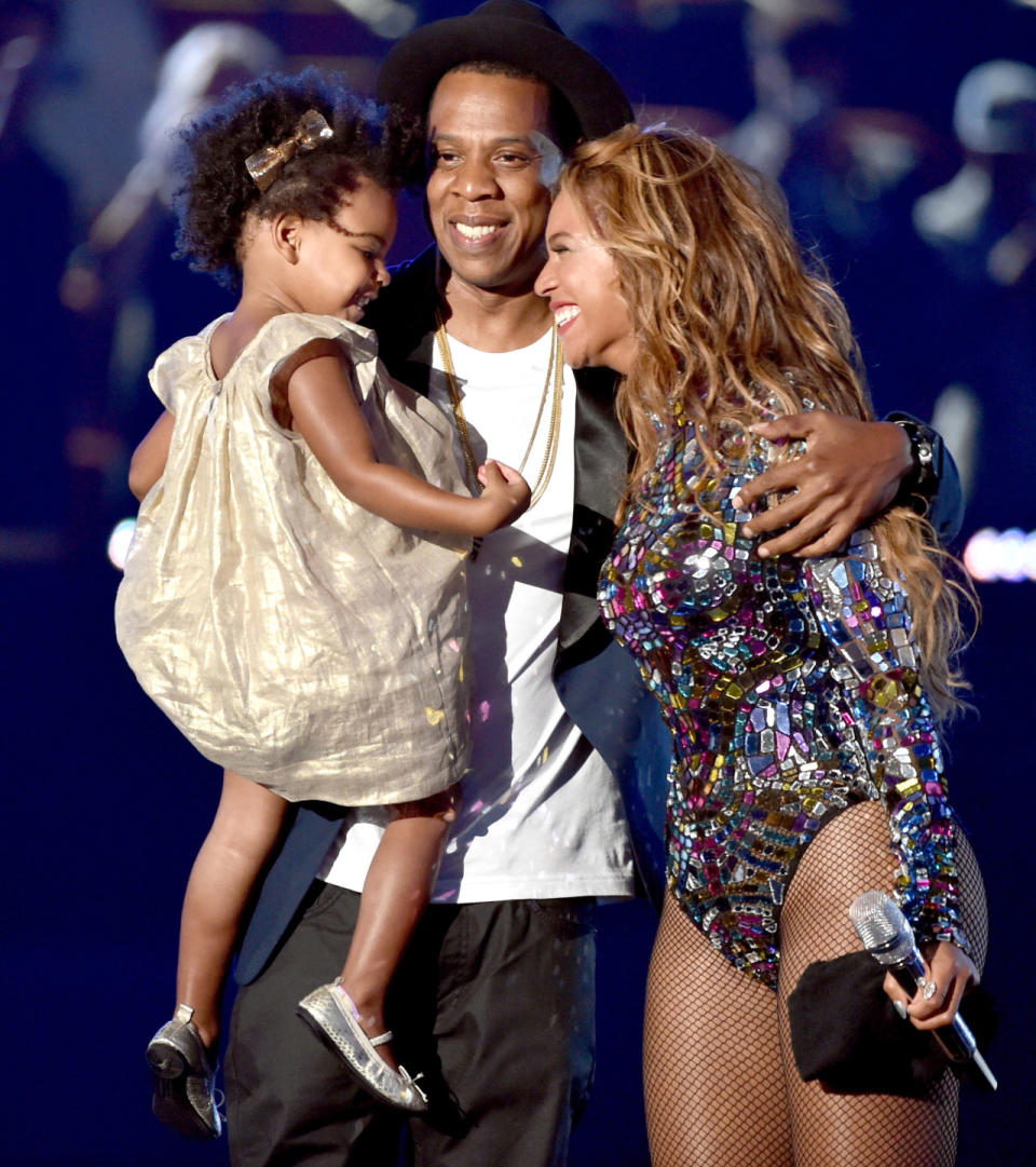 <p>It’s only fitting that Blue made her actual awards show debut at the VMAs — three years after Bey debuted her bump at that show. It was a big year for the “Drunk in Love” singer with a bunch of nominations and she was also the Michael Jackson Video Vanguard Award recipient. Jay and Blue joined her onstage and it was certainly an emotional time or the family. She cried and they group hugged and the whole thing pulled on our heartstrings, especially because not long before she opened up about suffering a miscarriage. (Photo: Kevin Winter/MTV1415/Getty Images for MTV) </p>