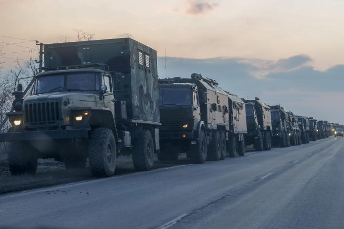 A convoy of Russian military vehicles is seen as the vehicles move towards border in Donbas region of eastern Ukraine on February 23, 2022 in Russian border city Rostov. (Stringer/Anadolu Agency via Getty Images)