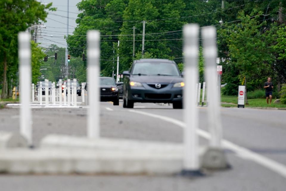 Traffic-calming devices in College Hill aim to slow speeds and reduce accidents.