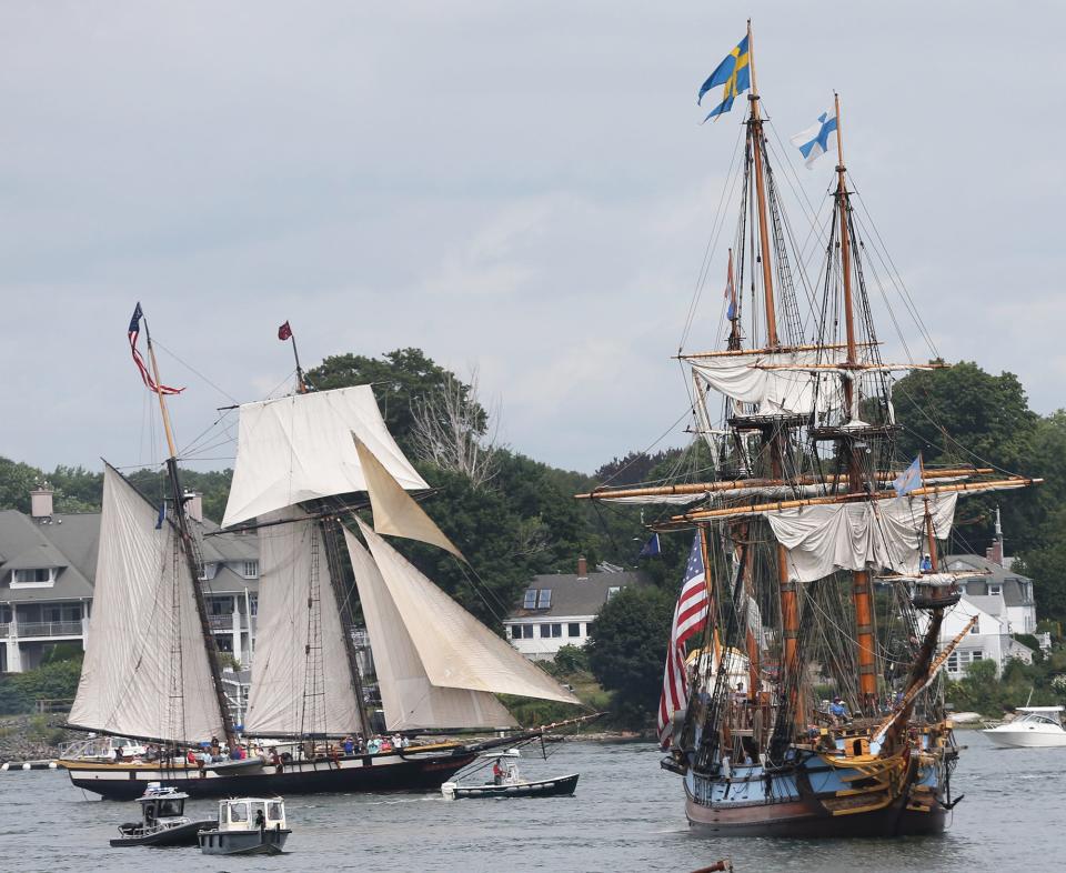 The Lynx, left, and The Kalmar Nyckel arrive in Portsmouth in the Parade of Sail up the Piscataqua River Thursday, Aug. 11, 2022 and kick off the Sail Portsmouth Festival.