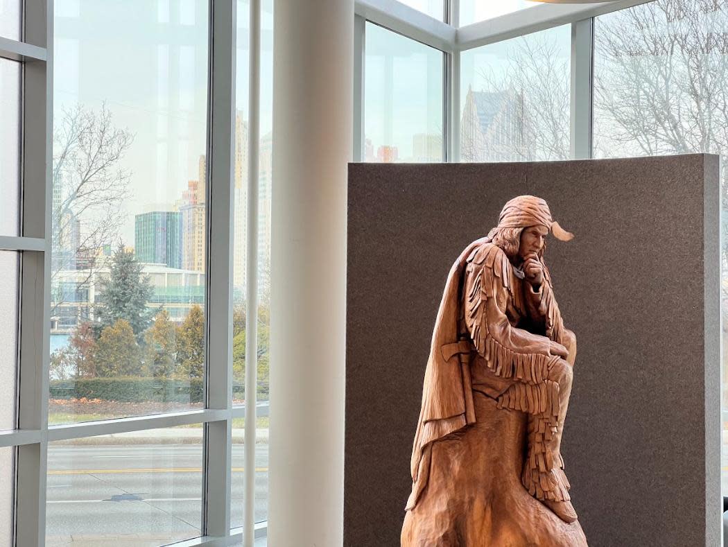 Statue of Chief Tecumseh at Windsor's Chimczuk Museum, with downtown Detroit in the background. The Chimczuk Museum will be one of the locations displaying submissions from the Windsor's Voices initiative. (Josiah Sinanan / CBC News - image credit)