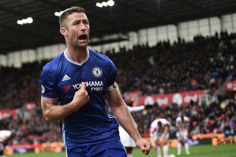 Chelsea's English defender Gary Cahill celebrates after scoring during the English Premier League football match between Stoke City and Chelsea at the Bet365 Stadium in Stoke-on-Trent, central England on March 18, 2017