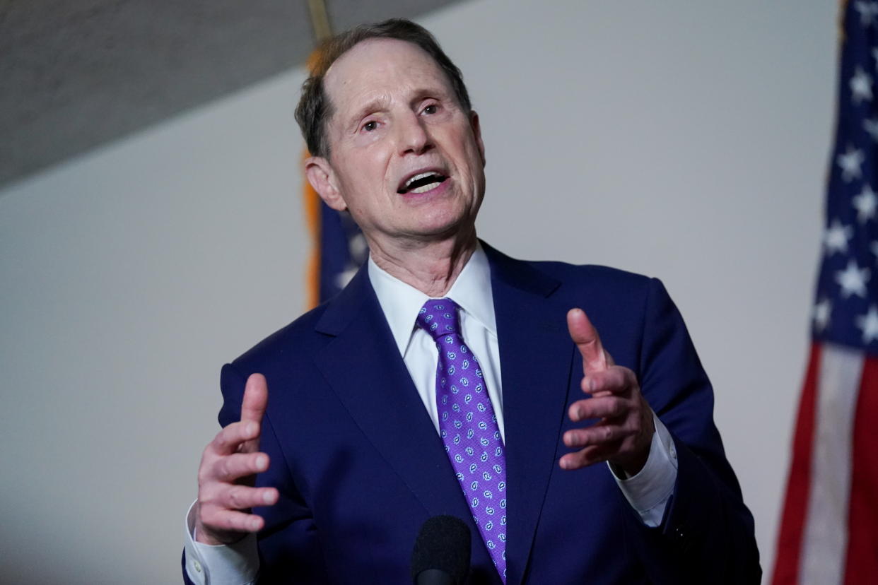 Sen. Ron Wyden (D-OR) speaks during a news conference after the first Democratic luncheon meeting since COVID-19 restrictions went into effect on Capitol Hill in Washington, U.S. April 13, 2021. REUTERS/Erin Scott