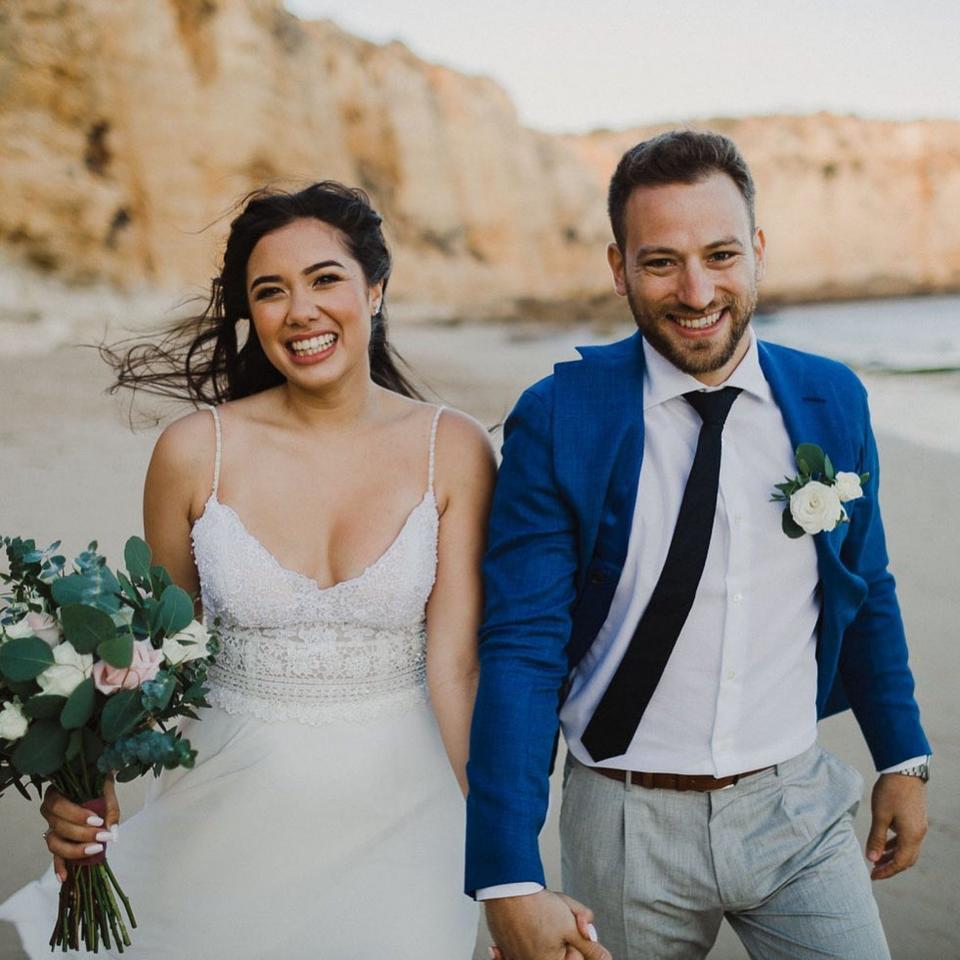 Caroline Crouch and Charalambos (Babis) Anagnostopoulos on their wedding day in Praia Do Canavial, Portugal - Athena Pictures