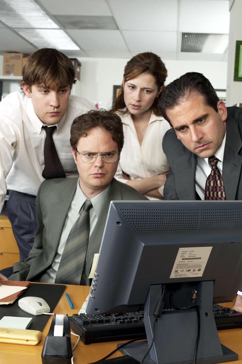 John Krasinski,  Rainn Wilson, Jenna Fischer, Steve Carell in NBC's "The Office," the most popular network series on streaming last year.  The show moved from Netflix to Peacock in January.