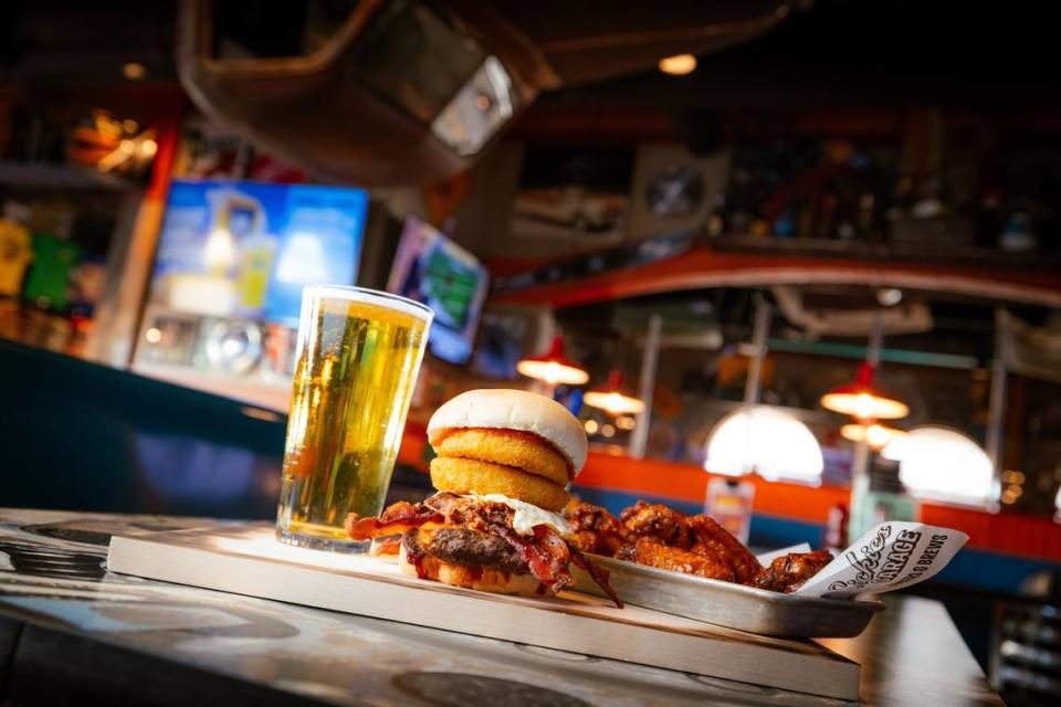 Sickies Garage specializes in burgers, beer, wings and more.