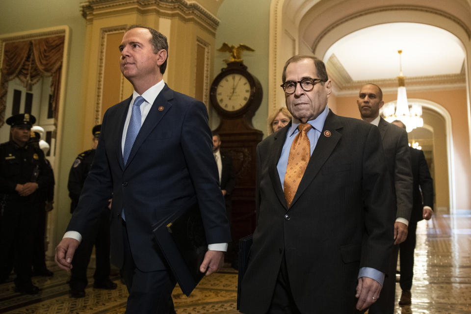 House Intelligence Committee Chairman Adam Schiff, D-Calif., front left, and House Judiciary Committee Chairman, Rep. Jerrold Nadler, D-N.Y., and other House impeachment managers, walk to the Senate chamber on Capitol Hill in Washington, Thursday, Jan. 16, 2020. (AP Photo/Matt Rourke)