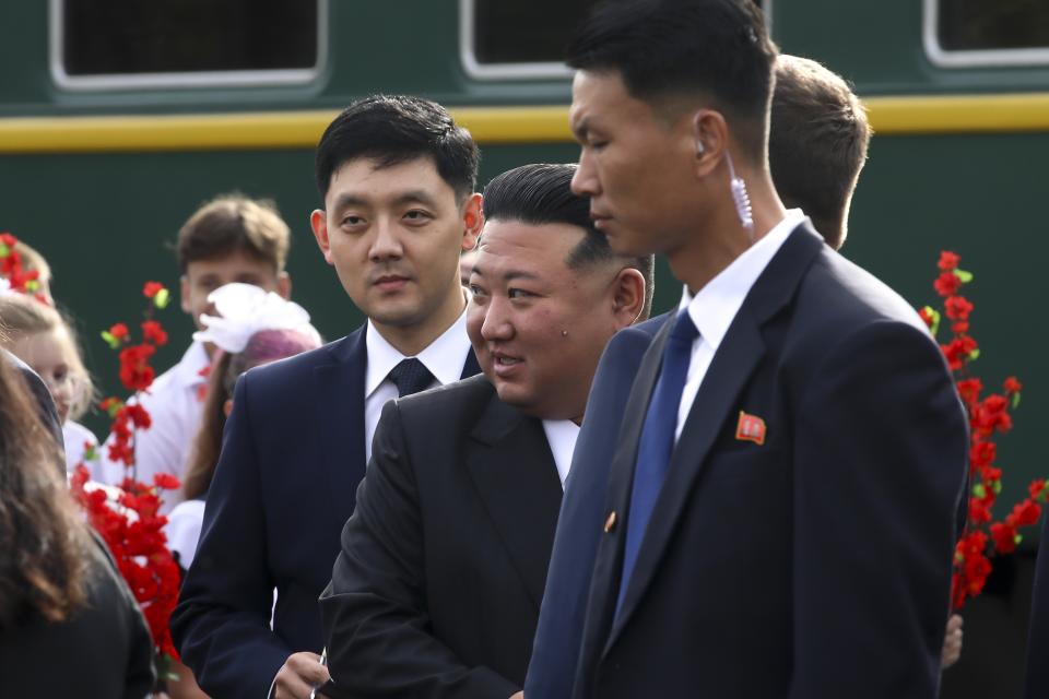 In this photo released by Government of the Russian far eastern region of Primorsky Krai, North Korea's leader Kim Jong Un walks surrounded by his bodyguards after arriving in Artyom, near Vladivostok, Russian Far East on Saturday, Sept. 16, 2023. (Governor of the Russian far eastern region of Primorsky Krai Oleg Kozhemyako telegram channel via AP)