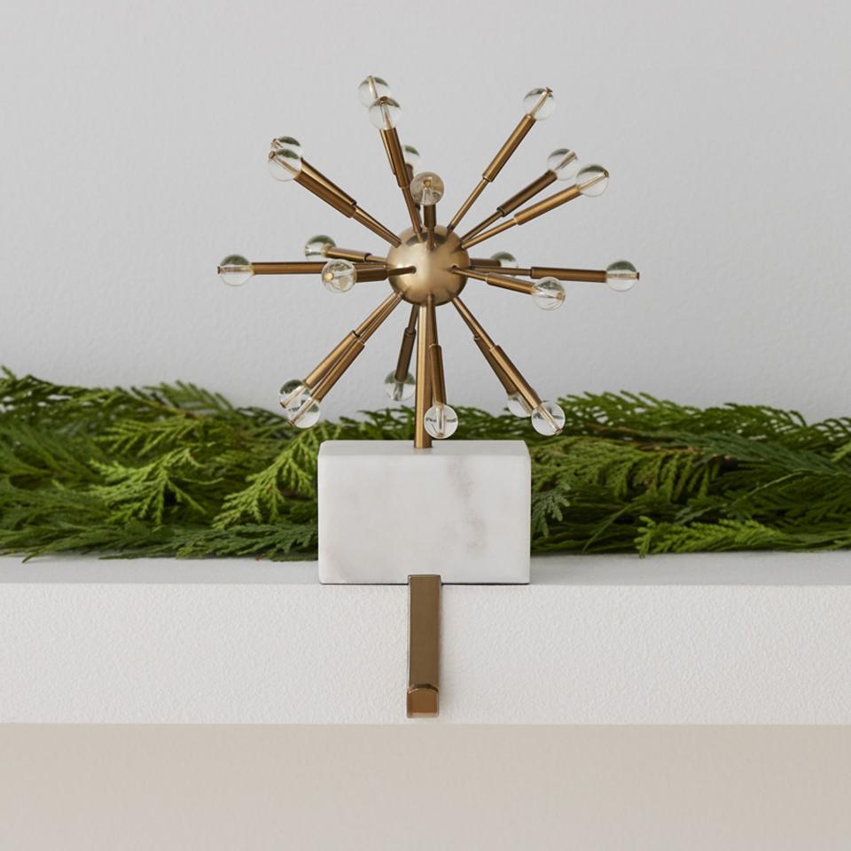 <p><a href="https://go.redirectingat.com?id=74968X1596630&url=https%3A%2F%2Fwww.westelm.com%2Fproducts%2Fsputnik-marble-brass-stocking-holder-d5516&sref=https%3A%2F%2Fwww.housebeautiful.com%2Fshopping%2Fhome-accessories%2Fg41902567%2Fmid-century-modern-christmas-decor%2F" rel="nofollow noopener" target="_blank" data-ylk="slk:Shop Now;elm:context_link;itc:0;sec:content-canvas" class="link ">Shop Now</a></p><p>Sputnik Marble & Brass Stocking Holder</p><p>westelm.com</p><p>$45.00</p><span class="copyright">West Elm</span>