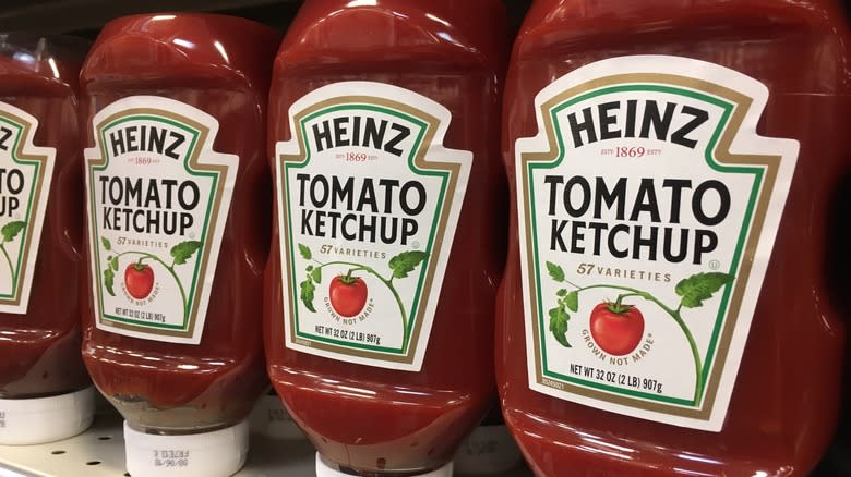 Rows of Heiz Tomato Ketchup in grocery shelf