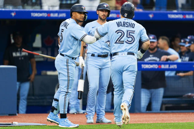 Toronto Blue Jays' Daulton Varsho (25) celebrates his solo home