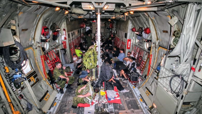 Exhaustion, concern and relief on board first Hercules airlift for Manitoba fire evacuees