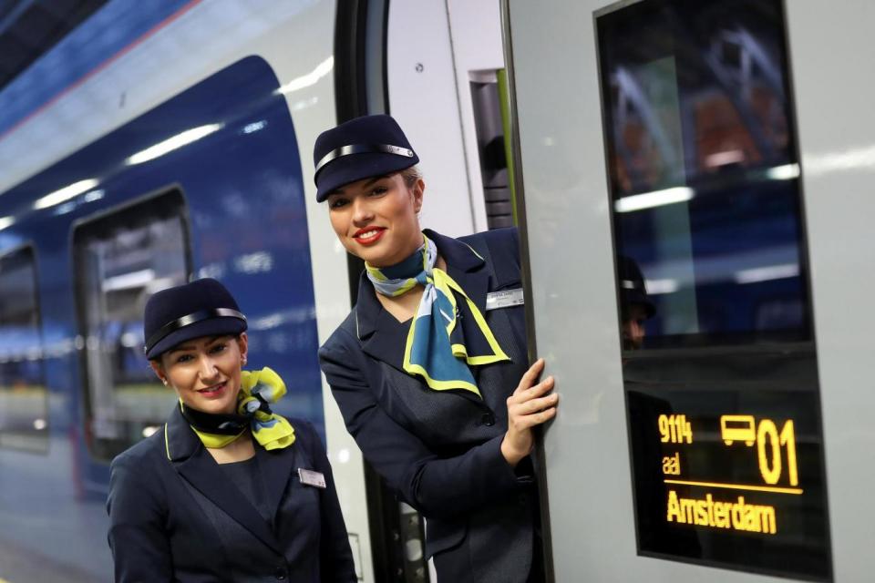 Workers on a Eurostar bound for Amsterdam at St Pancras station (REUTERS)