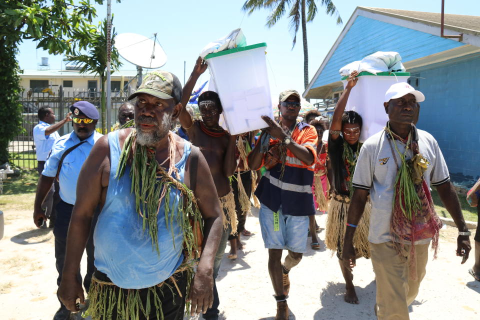 In this Nov. 29, 2019, photo, the ballot boxes are returned in the Bougainville referendum in Buka, Bougainville, Papua New Guinea. All across the Pacific region of Bougainville, people have been voting in a historic referendum to decide if they want to become the world’s newest nation by gaining independence from Papua New Guinea. (Jeremy Miller, Bougainville Referendum Commission via AP)