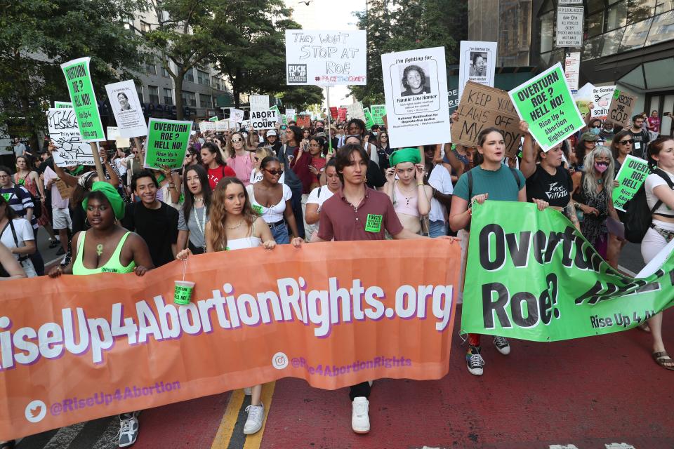 Demonstrators march from Union Square Park to Washington Square Park in New York City to protest the Supreme Court ruling overturning Roe v Wade June 24, 2022. 