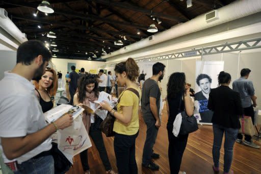 Students and young graduates visit in May a job fair at the Athens Technopolis 2012, organized by technological firms and students organizations. As Greece struggles to get out of its financial crisis through spending cuts and economic reforms, the European Commission has promised to launch an action plan to boost youth employment by the end of this year