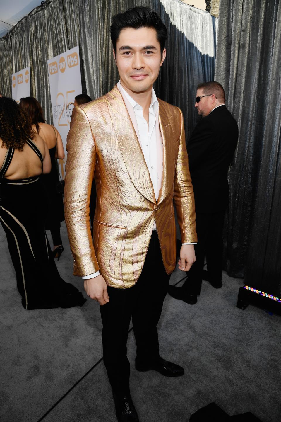 <h1 class="title">Henry Golding in Tom Ford</h1><cite class="credit">Photo: Getty Images</cite>