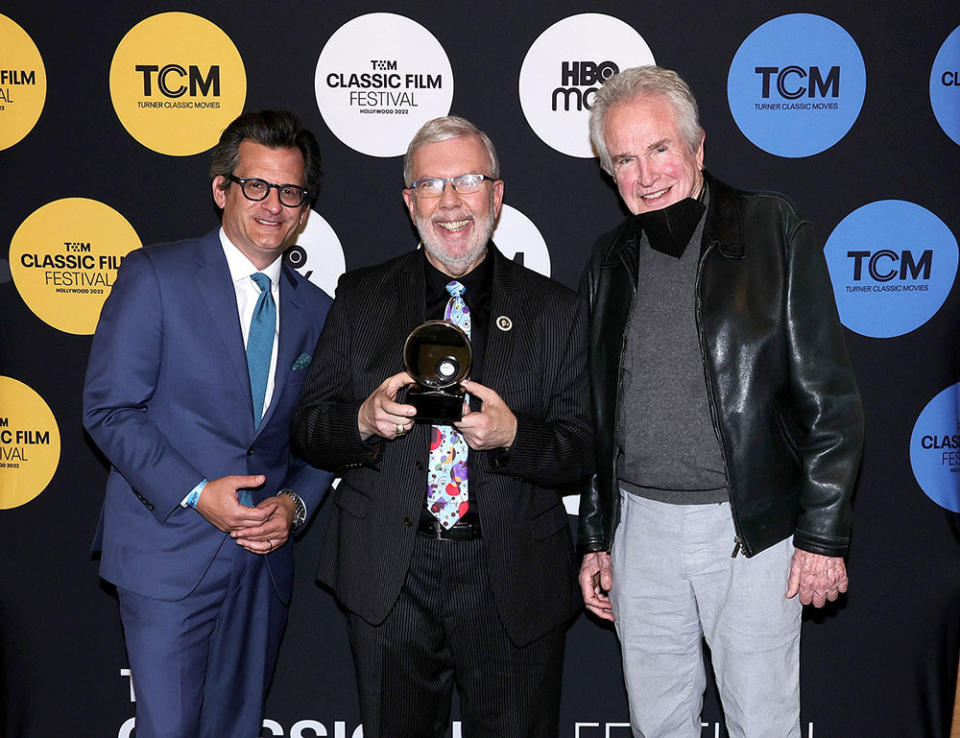 TCM host Ben Mankiewicz, Robert Osborne Award recipient Leonard Maltin and special guest Warren Beatty - Credit: Emma McIntyre/Getty Images