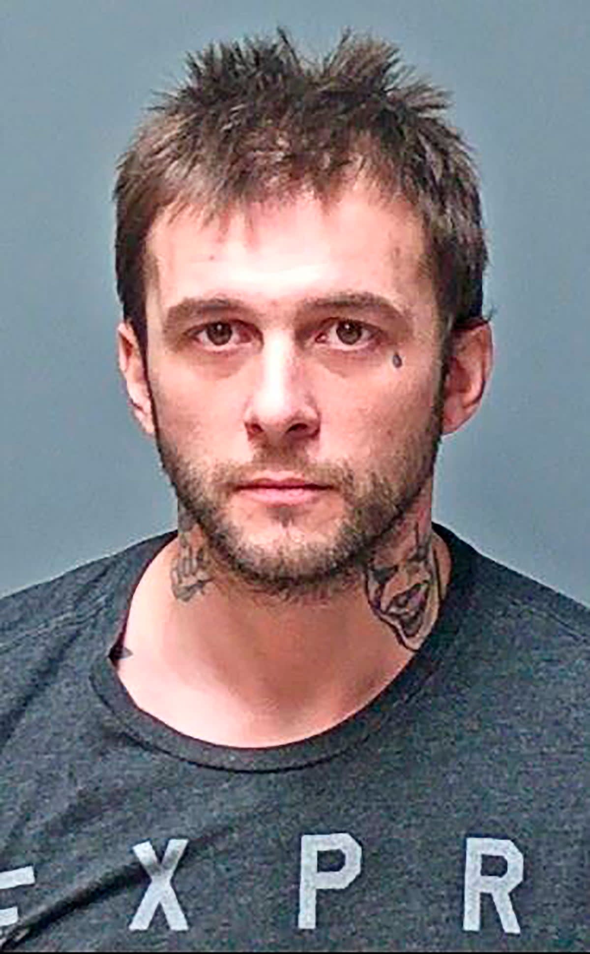 Harmony’s father, Adam Montgomery in his booking photo (AP)