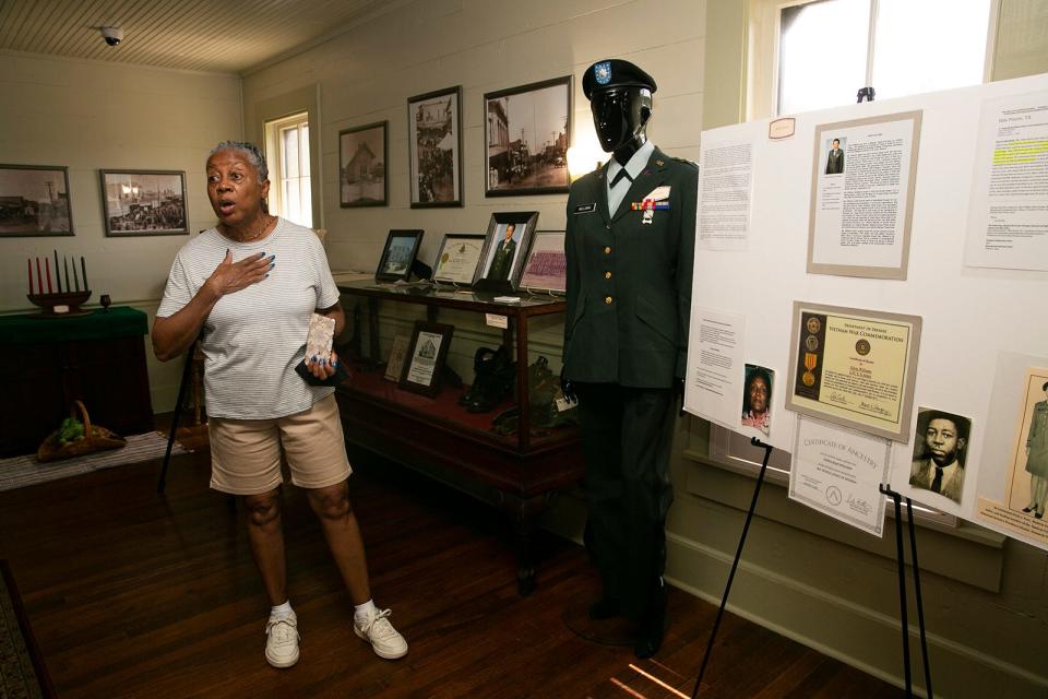 Board President Doris Williams speaks about her family history at the Bastrop County African American Cultural Center's Freedom Colonies Museum at the Kerr Community Center on Friday, June 17, 2022. 