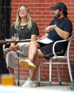 <p>Jenny Mollen and Jason Biggs enjoy their afternoon at a cafe in N.Y.C. on Tuesday.</p>