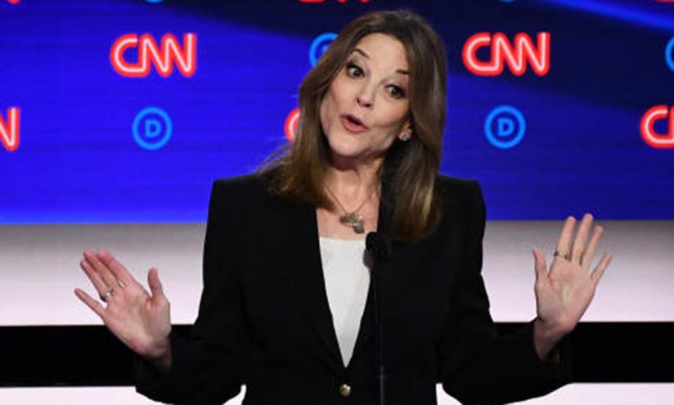 Closeup of Marianne Williamson against a backdrop that says "CNN."