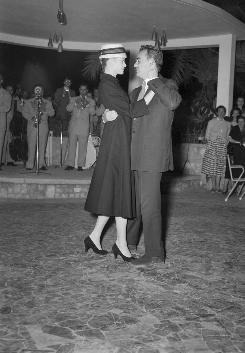 <p>While in Palma de Mallorca, Spain, the couple shares a romantic dance.</p>