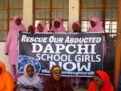 Schoolgirls wait for the arrival of Nigeria's President Muhammadu Buhari at the Goverment girls' science and technical college in Dapchi, Nigeria March 14, 2018. REUTERS/Ola Lanre