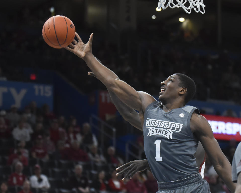 Mississippi State forward Reggie Perry (1) goes after a rebound during the first half of an NCAA college basketball game in Oklahoma City, Saturday, Jan. 25, 2020. (AP Photo/Kyle Phillips)