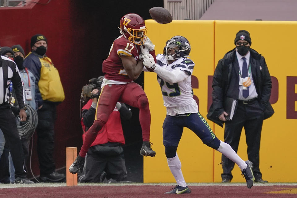 Seattle Seahawks free safety D.J. Reed (29) stops Washington Football Team wide receiver Terry McLaurin (17) from making a catch in the end zone during the second half of an NFL football game, Sunday, Dec. 20, 2020, in Landover, Md. (AP Photo/Andrew Harnik)