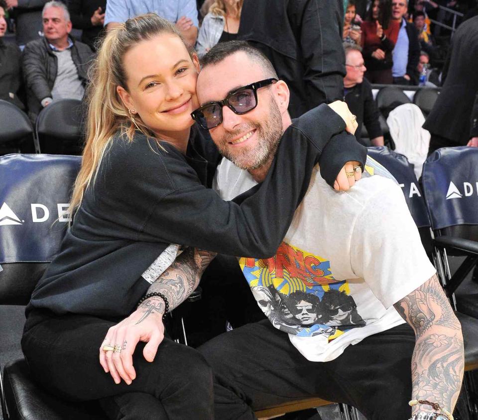 Adam Levine and Behati Prinsloo attend a basketball game between the Los Angeles Lakers and the Dallas Mavericks at Staples Center on December 01, 2019 in Los Angeles, California