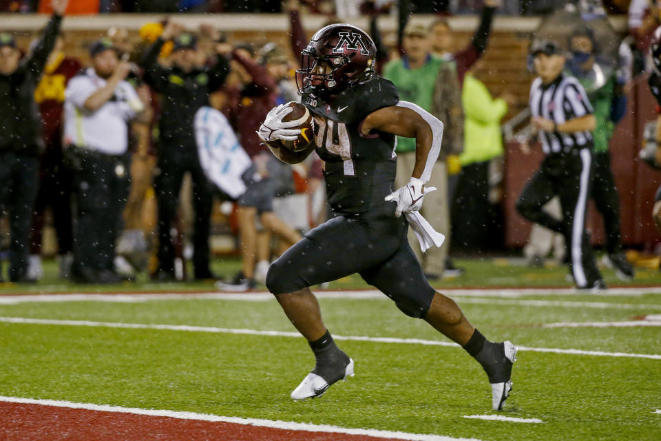 Minnesota running back Mohamed Ibrahim rushes for a touchdown against Ohio State during the third quarter of an NCAA college football game Thursday, Sept. 2, 2021, in Minneapolis. Ohio State won 45-31. (AP Photo/Bruce Kluckhohn)