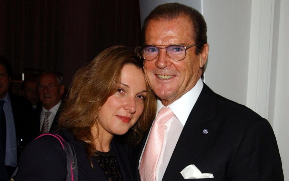 Barbara Broccoli with Sir Roger Moore, in 2003 - Getty