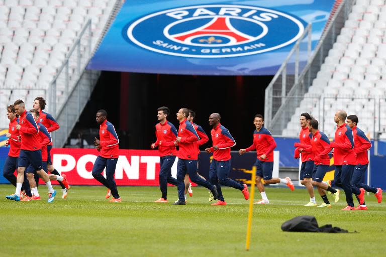 Paris Saint Germain take part in a training session at the Stade de France stadium in Saint Denis, on April 18, 2014