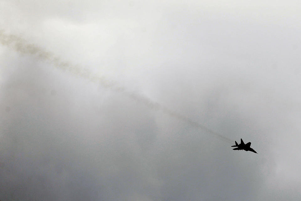 FILE - In this Tuesday, May 9, 2017 file photo, a Serbian army MiG-29 jet fighter performs during exercise at a ceremony marking 72 years since the end of WWII and the defeat of Nazi Germany, at Nikinci training ground, 60 kilometers west of Belgrade, Serbia. Serbia will continue to strengthen its armed forces and is ready to purchase more warplanes amid simmering tensions in the Balkans, the Serbian president said Sunday, July 26, 2020. (AP Photo/Darko Vojinovic, file)