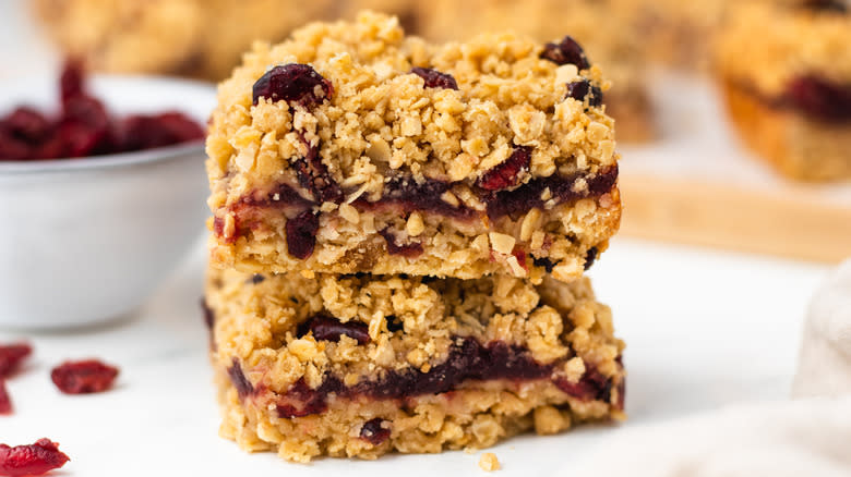 Two stacked cranberry oat bars