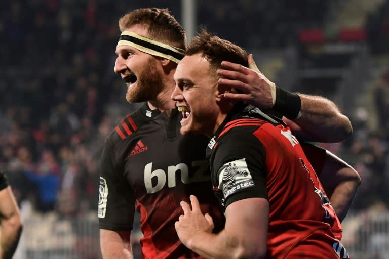 Canterbury Crusaders player Israel Dagg (right) celebrates his try in the Super Rugby semi-final against the Waikato Chiefs in Christchurch on July 29, 2017