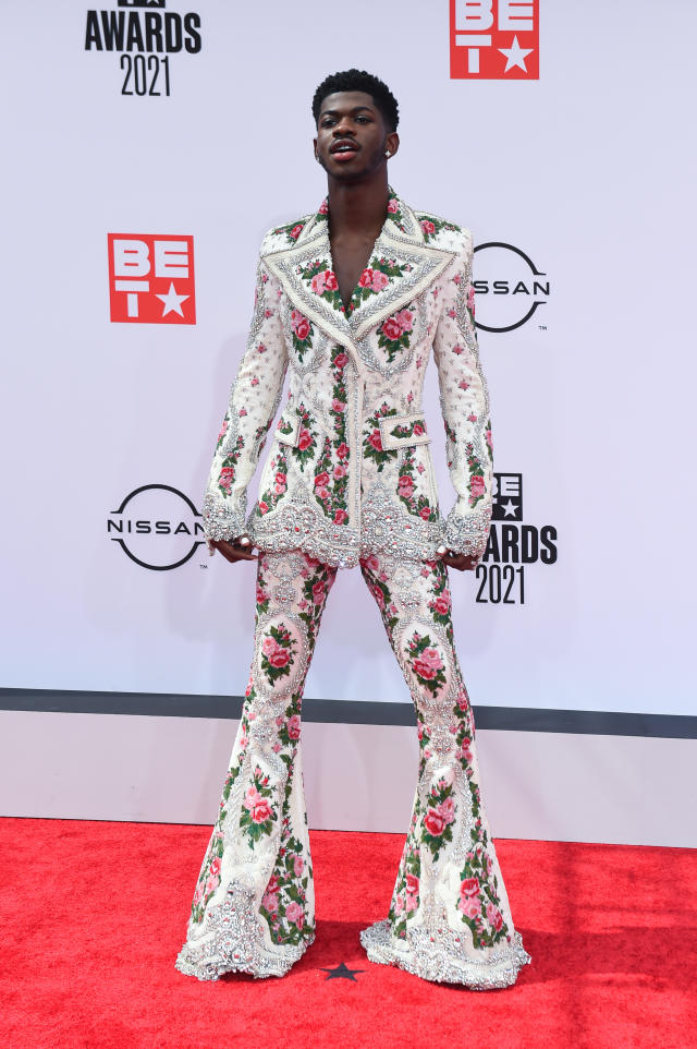 Lil Nas X kisses male dancer in fiery BET Awards performance