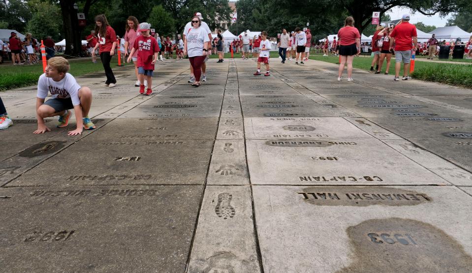 Alabama fans tour the Captains Plaza beside the Denny Chimes before Alabama faced Middle Tennessee State to open the season, Sept. 2, 2023.