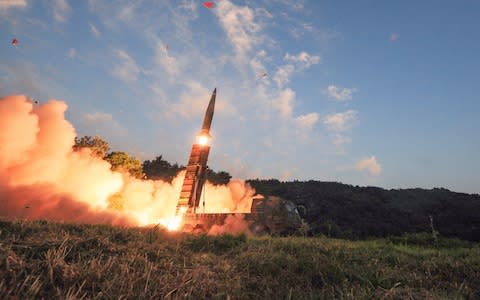 South Korea's Hyunmoo II ballistic missile is fired during a training exercise at an undisclosed location in South Korea on Monday - Credit: AP