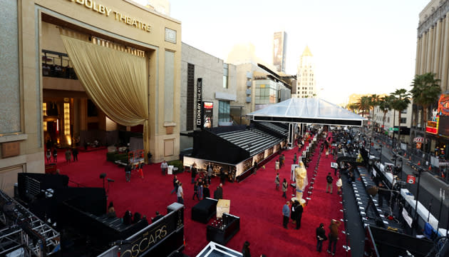 People prepare the red carpet at the Dolby Theatre for the 85th Academy Awards in Los Angeles. (Credit: PA)