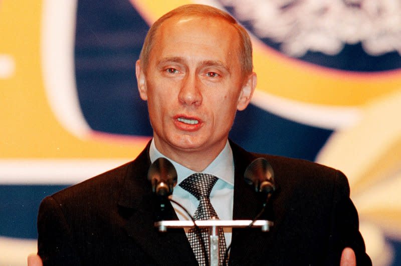 Russian President Vladimir Putin gestures as he addresses students and employees of the Bauman State Technical University in Moscow on November 21, 2000. On March 26, 2000, acting Russian President Vladimir Putin was elected president by a more than 20 percent margin. Putin won a third term in 2012. File Photo by Maxim Marmur/UPI