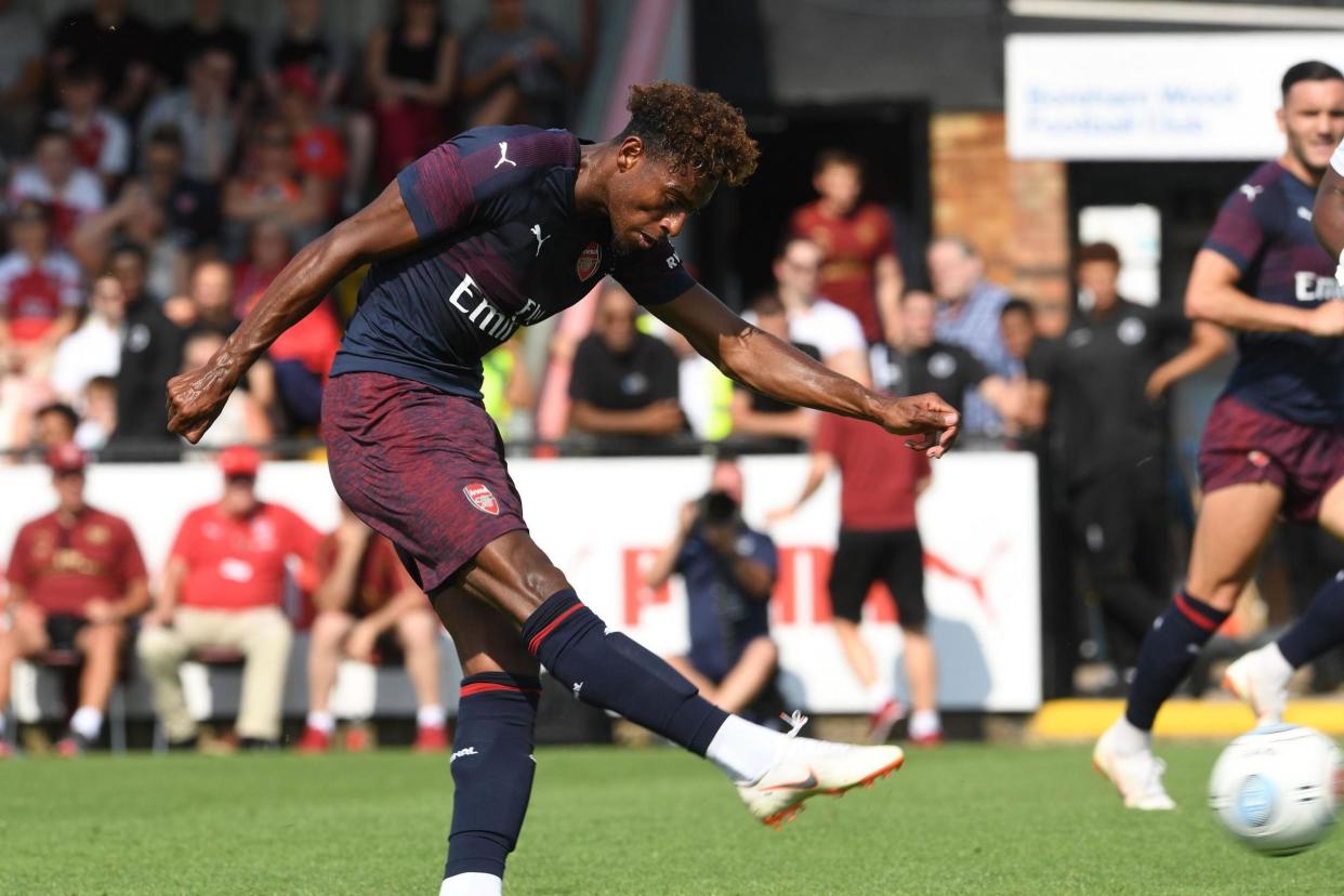 Reine-Adelaide in action against Boreham Wood, but he won't be making the trip to Singapore: Arsenal FC via Getty Images