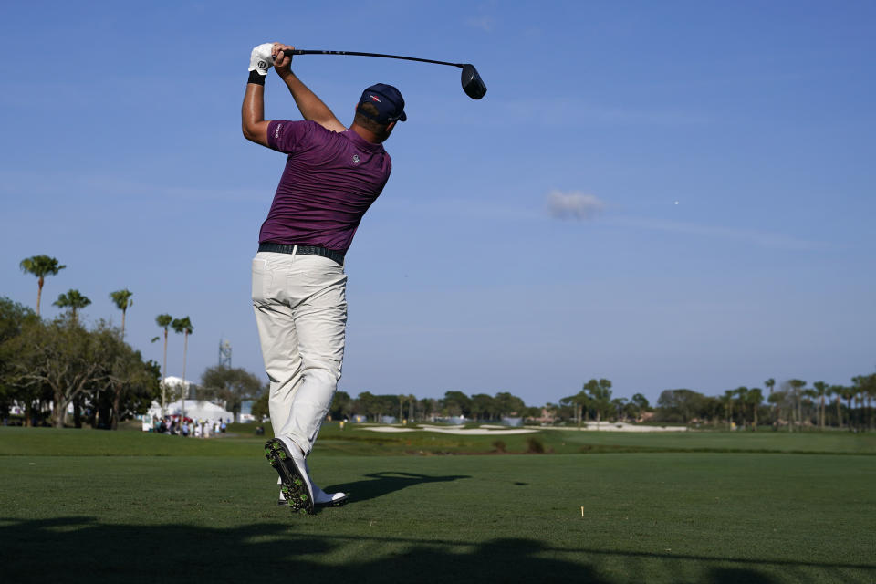 Brice Garnett hits from the 18th tee during the second round of the Honda Classic golf tournament, Friday, Feb. 24, 2023, in Palm Beach Gardens, Fla. (AP Photo/Lynne Sladky)
